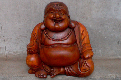 Smiling Buddha i teak